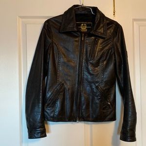 Black leather jacket. Good for Fall or Spring. EU 42 size. Made in Italy.